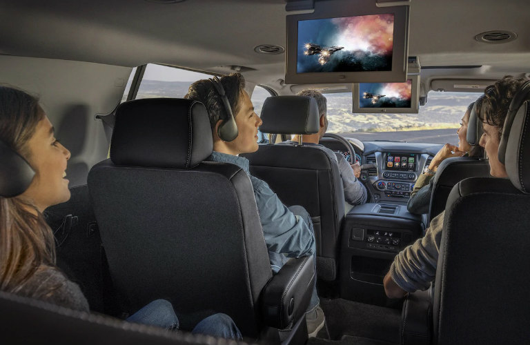 Family sitting inside 2019 Chevy Tahoe