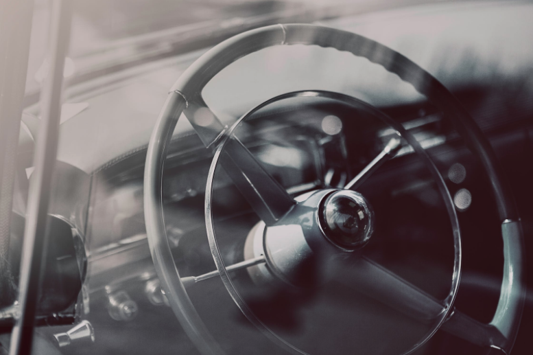 Should I buy a new or a used Cadillac?