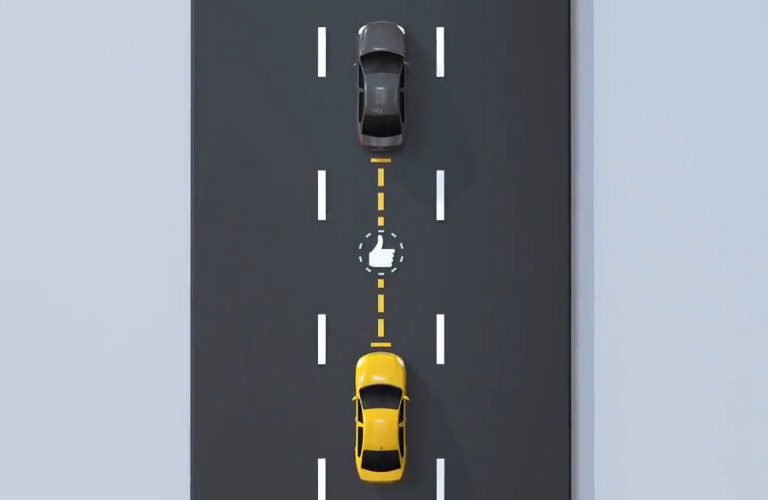 animation showing Chevy Adaptive Cruise Control in action viewing two cars on a highway from the top