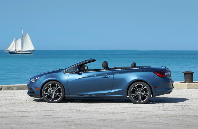 picture of 2019 Buick Cascada near water and a sailboat in the background